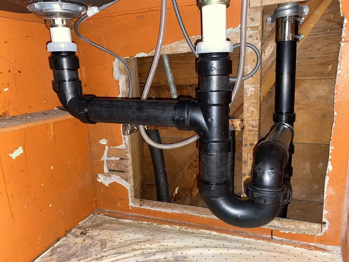 Professional Garbage Disposal Repair equipment and tools on the job in Pinewood